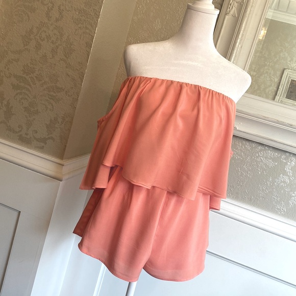 Forever 21 Pants - Coral romper with attached cap sleeves. Size M